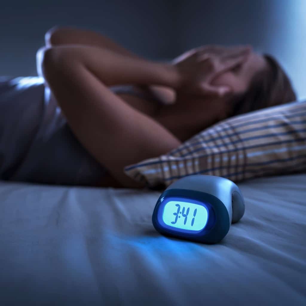 exhausted woman suffering from insomnia